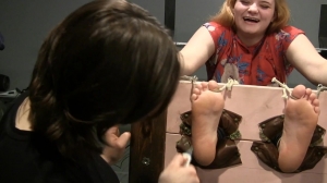 Lost footage Little Makayla in the stocks! it tickles so bad!! hahahah